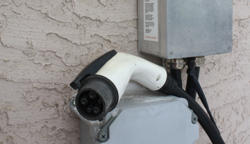 Level 2 charger on stucco wall