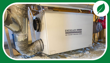 A box-like HRV unit with ducts attached in a crawl space