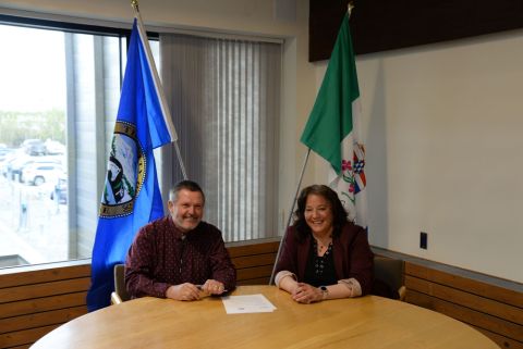 Mayor Kirk Cameron and Minister Cory Bellmore sign joint funding request letter to Minister Gregor Robertson.